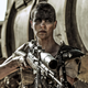 Charlize Theron as Furiosa.